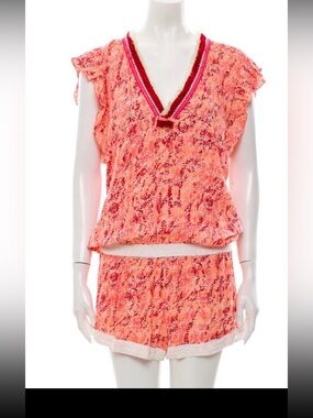 Poupette St. Barth’s  Coral Pink Printed Romper with Lace Trim